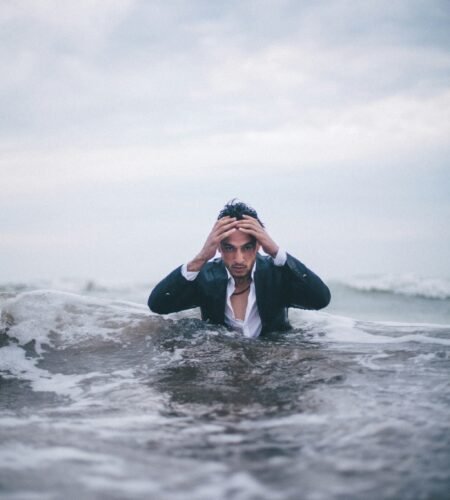 man on body of water during daytime