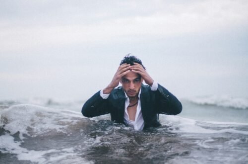 man on body of water during daytime